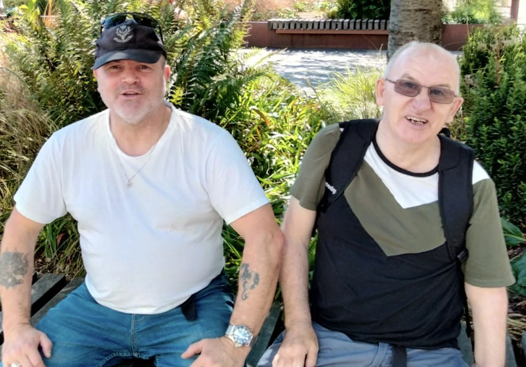 Two ment sitting together. A poem by pat